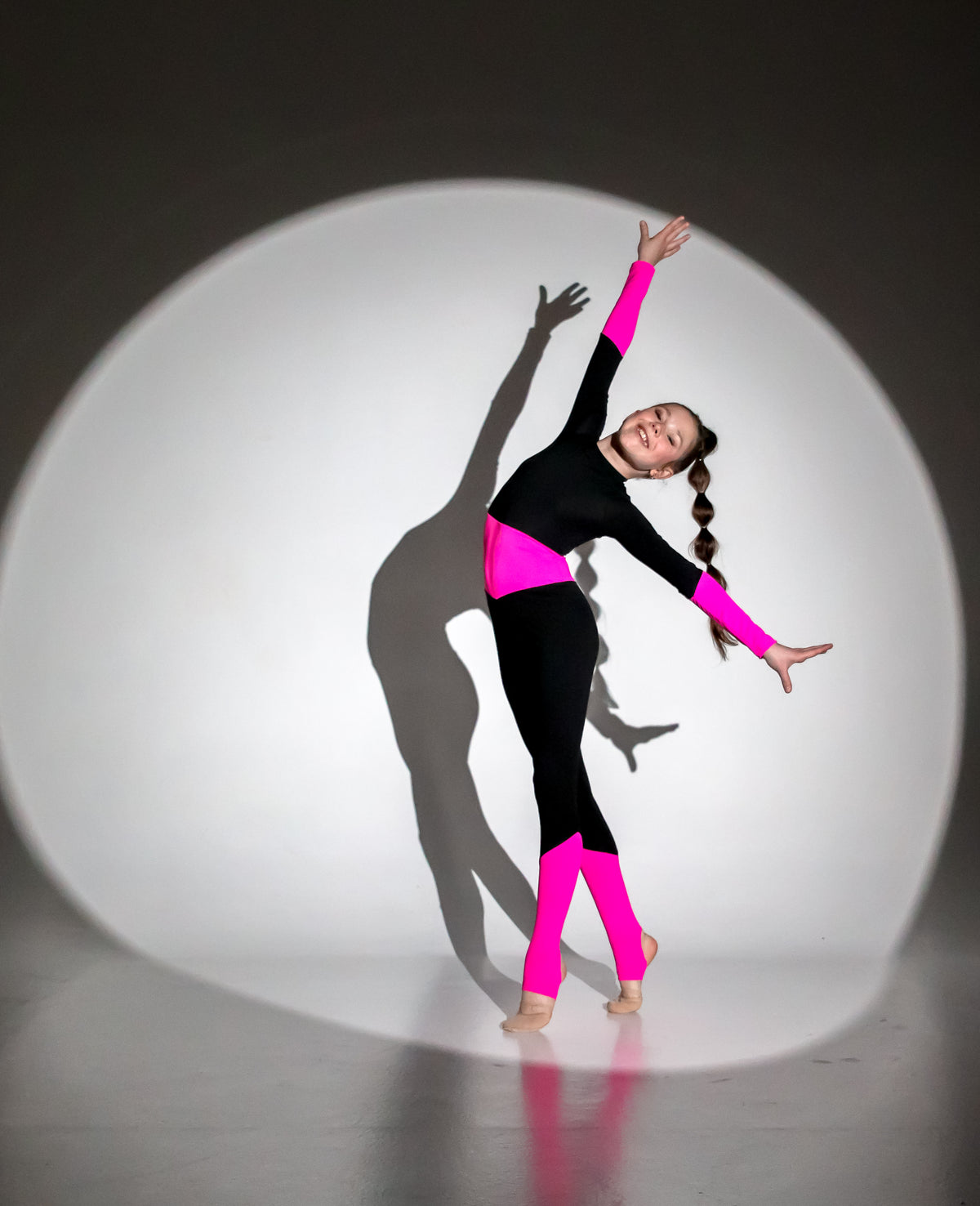 Long sleeve unitard with foot stirrups